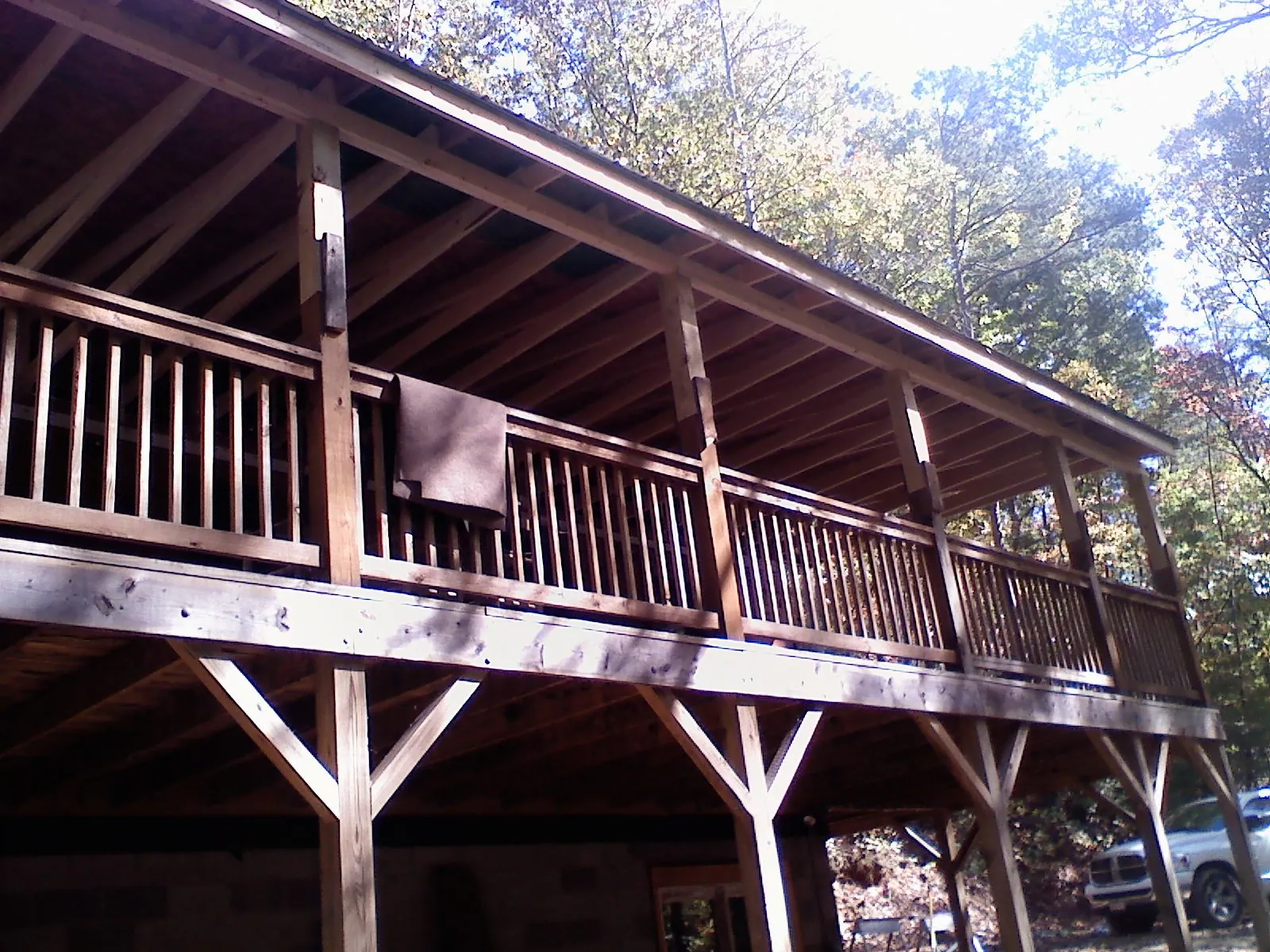 Timber framing under a new elevated porch and deck — Roof Leak Repair in Oak Forest by Roofing Brothers